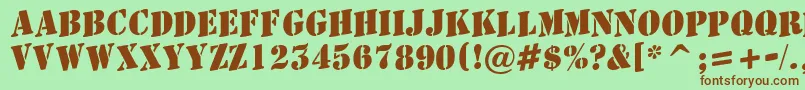 AStamperupBold-fontti – ruskeat fontit vihreällä taustalla