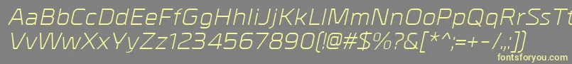 Czcionka MetralItalic – żółte czcionki na szarym tle