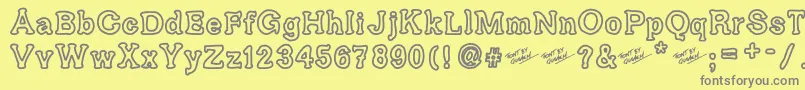 フォントAriendesse – 黄色の背景に灰色の文字