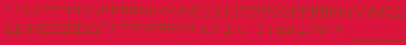 BraillenumBold-fontti – ruskeat fontit punaisella taustalla