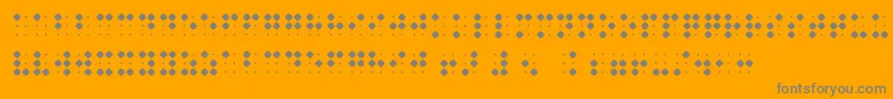 BraillenumBold-fontti – harmaat kirjasimet oranssilla taustalla