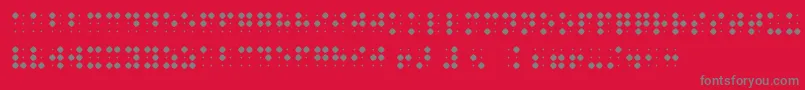 Czcionka BraillenumBold – szare czcionki na czerwonym tle