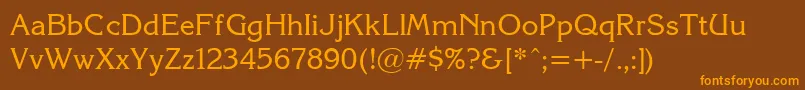 フォントKorin26 – オレンジ色の文字が茶色の背景にあります。