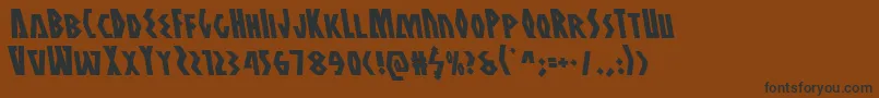 Antikytheraleft Font – Black Fonts on Brown Background
