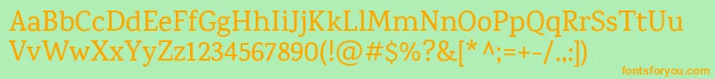KarmaMedium Font – Orange Fonts on Green Background