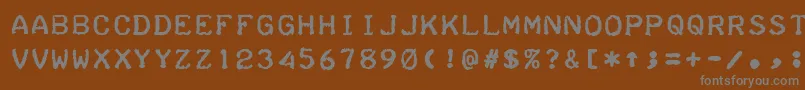 フォントTeleprinterBold – 茶色の背景に灰色の文字