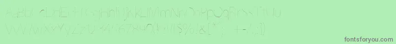 フォントGrutchline – 緑の背景に灰色の文字