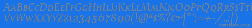 フォントDevroyeScosf – 青い背景に灰色の文字