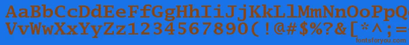 フォントLucidatypewriterstdBold – 茶色の文字が青い背景にあります。