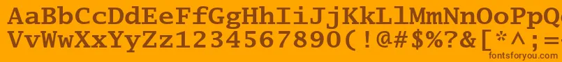 LucidatypewriterstdBold-fontti – ruskeat fontit oranssilla taustalla