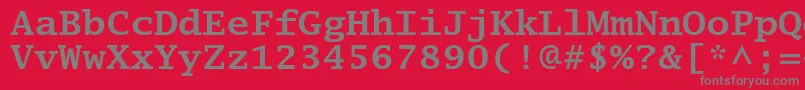 LucidatypewriterstdBold-fontti – harmaat kirjasimet punaisella taustalla