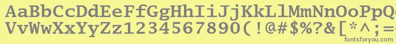 LucidatypewriterstdBold-fontti – harmaat kirjasimet keltaisella taustalla