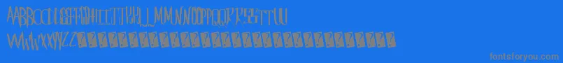 Saberhusk-Schriftart – Graue Schriften auf blauem Hintergrund