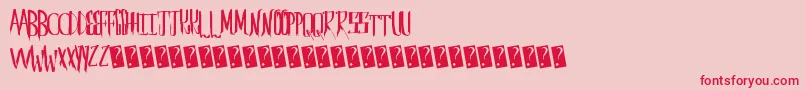 Saberhusk Font – Red Fonts on Pink Background