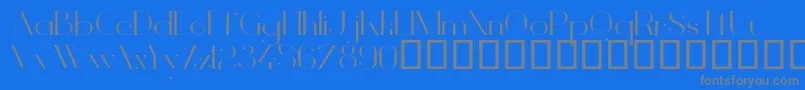 VanityLightWide-fontti – harmaat kirjasimet sinisellä taustalla