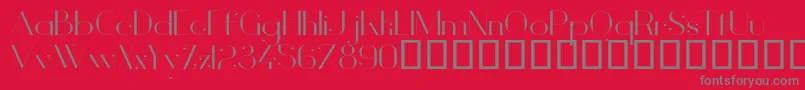 VanityLightWide-fontti – harmaat kirjasimet punaisella taustalla