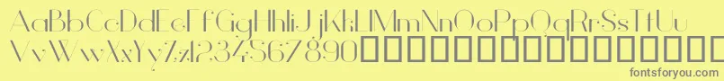 VanityLightWide-fontti – harmaat kirjasimet keltaisella taustalla