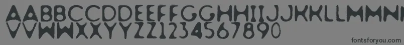 Dogfighter-Schriftart – Schwarze Schriften auf grauem Hintergrund