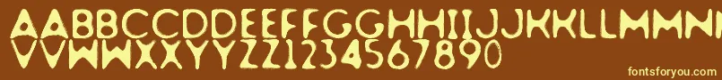 Dogfighter-fontti – keltaiset fontit ruskealla taustalla