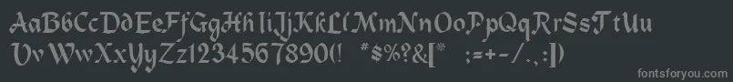 Zepplin-fontti – harmaat kirjasimet mustalla taustalla