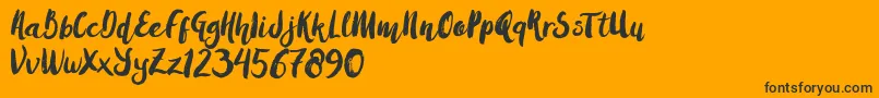 AmulhedBrushDemo Font – Black Fonts on Orange Background