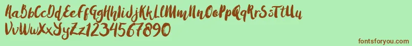 AmulhedBrushDemo Font – Brown Fonts on Green Background