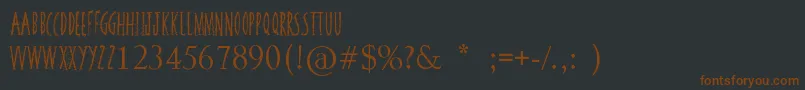 SquiggleyBrown-fontti – ruskeat fontit mustalla taustalla