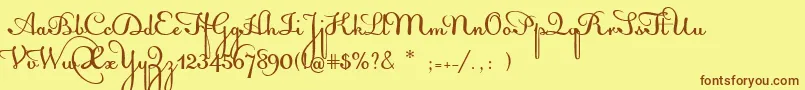 フォントAcquestScript – 茶色の文字が黄色の背景にあります。