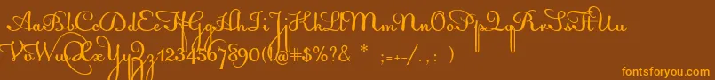 フォントAcquestScript – オレンジ色の文字が茶色の背景にあります。