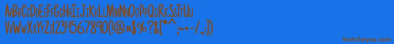 フォントPhotographs – 茶色の文字が青い背景にあります。