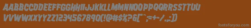 Dreadringerrotate2-Schriftart – Graue Schriften auf braunem Hintergrund