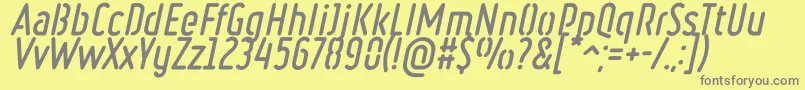 RulerStencilBoldItalic-fontti – harmaat kirjasimet keltaisella taustalla