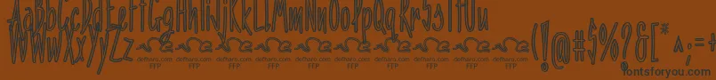PenitenciaInlineFfp Font – Black Fonts on Brown Background