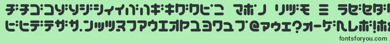 TeacherK Font – Black Fonts on Green Background