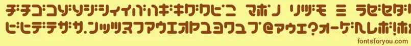 TeacherK Font – Brown Fonts on Yellow Background