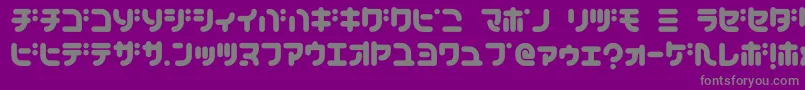 フォントTeacherK – 紫の背景に灰色の文字