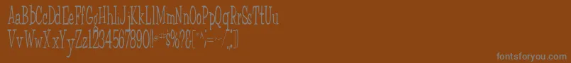 FairWeatherRegular-fontti – harmaat kirjasimet ruskealla taustalla