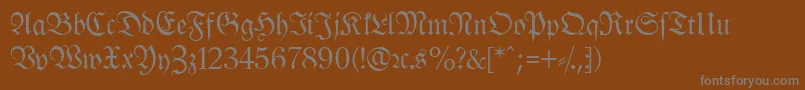 LeipzigFrakturNormal-Schriftart – Graue Schriften auf braunem Hintergrund