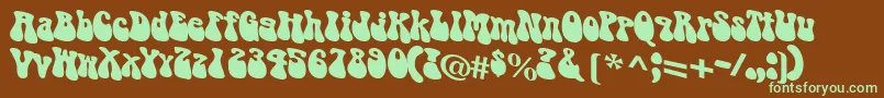 Puppylike Font – Green Fonts on Brown Background