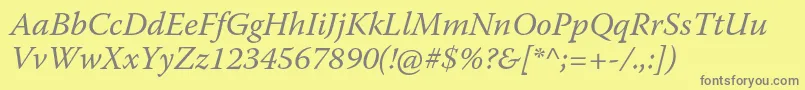 フォントWarnockproIt – 黄色の背景に灰色の文字