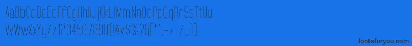 TallFilmsExpanded Font – Black Fonts on Blue Background