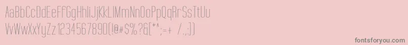 TallFilmsExpanded-fontti – harmaat kirjasimet vaaleanpunaisella taustalla