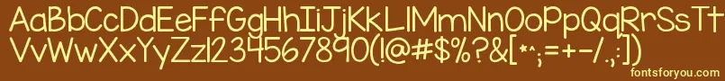 Kgmissspeechyipa Font – Yellow Fonts on Brown Background