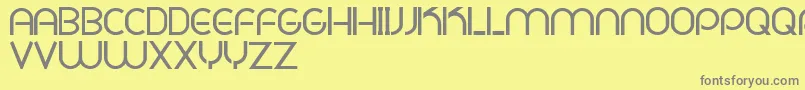 PligNovaParaDafontSoloLetras-fontti – harmaat kirjasimet keltaisella taustalla