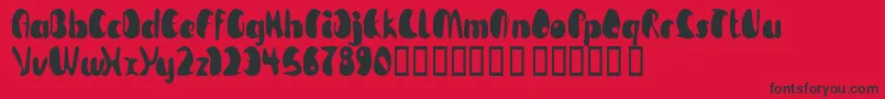 フォントTmBeguiled – 赤い背景に黒い文字