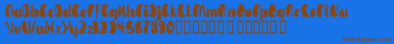 TmBeguiled Font – Brown Fonts on Blue Background