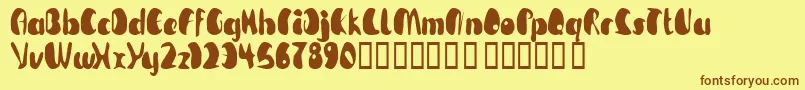TmBeguiled Font – Brown Fonts on Yellow Background