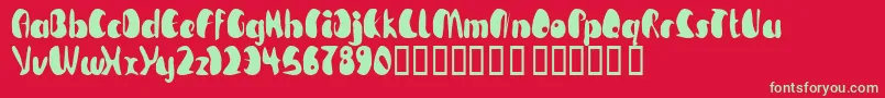 Saiba mais sobre a fonte TmBeguiled Fonte TmBeguiled – fontes verdes em um fundo vermelho
