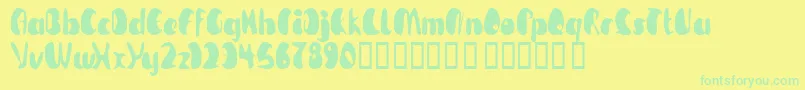 フォントTmBeguiled – 黄色い背景に緑の文字