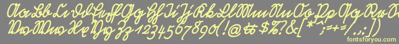 RastenburgSchraegU1sy-fontti – keltaiset fontit harmaalla taustalla